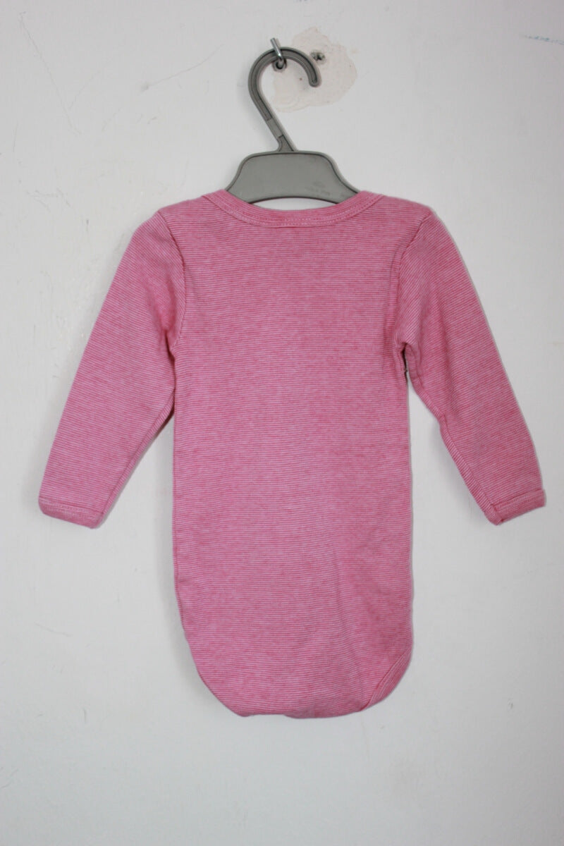 preloved katoenen roze overslagromper met lange mouwen van petit bateau in maat 68 voor een baby meisje