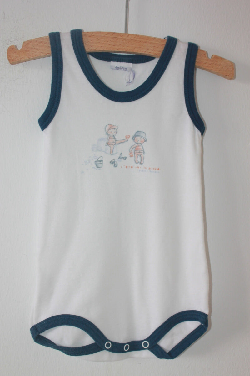 tweedehands unisex katoenen wit met donkerblauwe mouwloze romper van petit bateau in maat 68