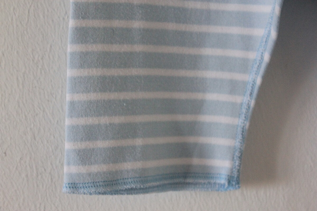 preloved unisex lichtblauw met witte gestreepte lange broek van petit bateau in maat 68