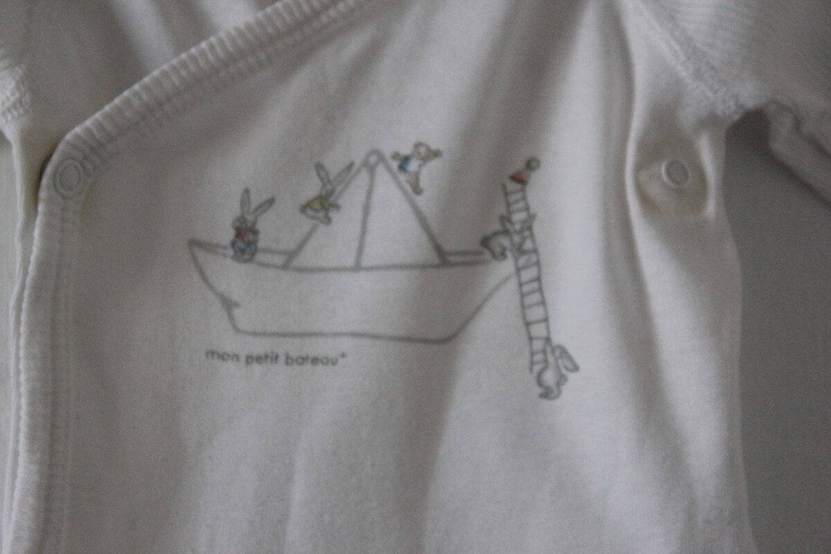 preloved katoenen unisex witte overslagromper met lange mouwen van petit bateau in maat 50