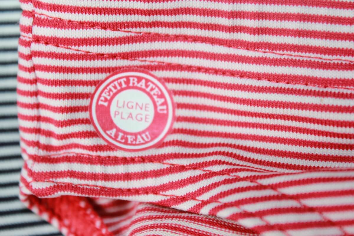 preloved rood met wit gestreepte zwembroek van petit bateau in maat 80 voor een baby jongen