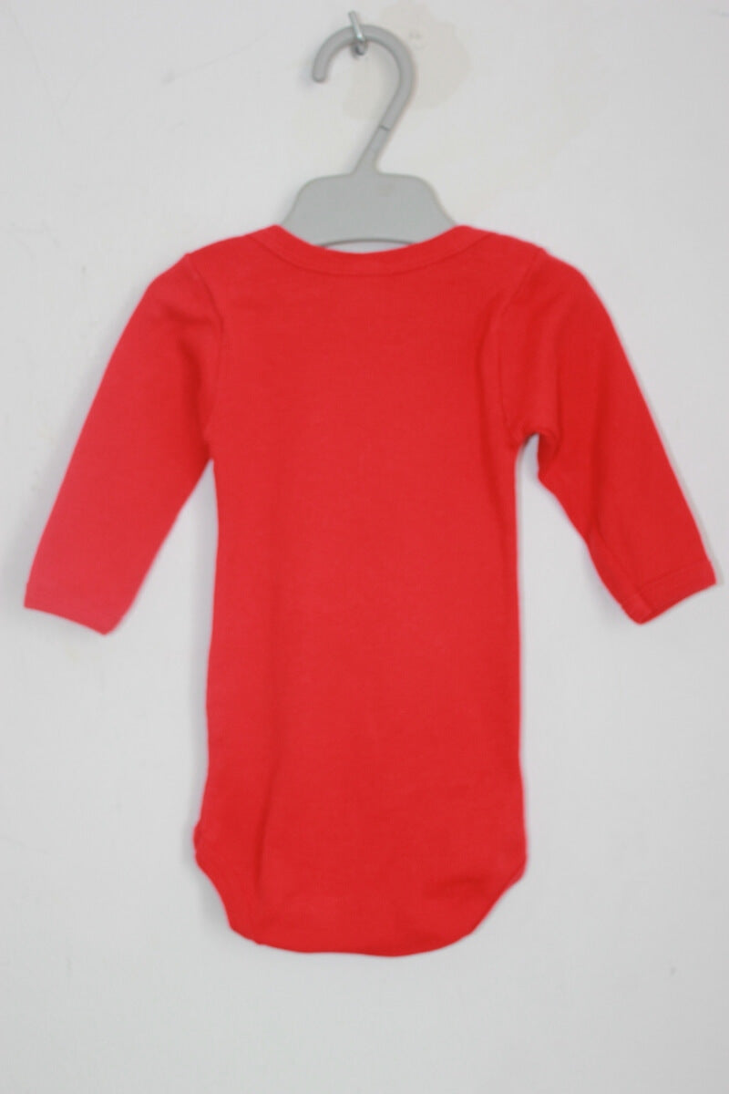 tweedehands unisex katoenen rode romper met lange mouwen in maat 62 van petit bateau