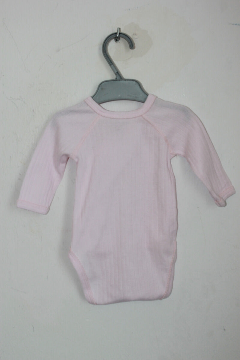 preloved roze overslagromper met lange mouwen in maat 62 van petit bateau