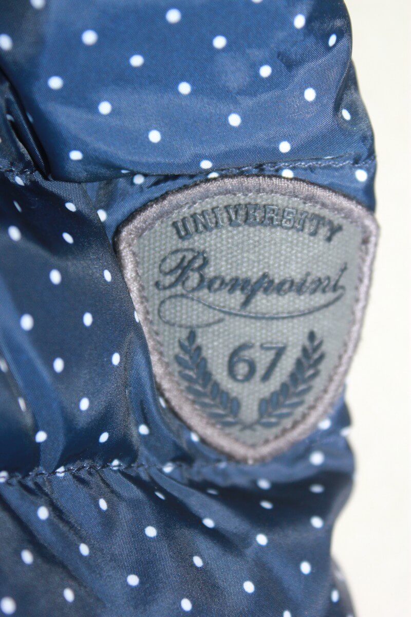 tweedehands donkerblauwe jas met witte stipjes van bonpoint in maat 134-140