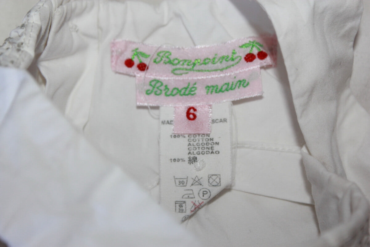 tweedehands mouwloze witte katoenen zomerse gesmockte jurk van bonpoint in maat 62