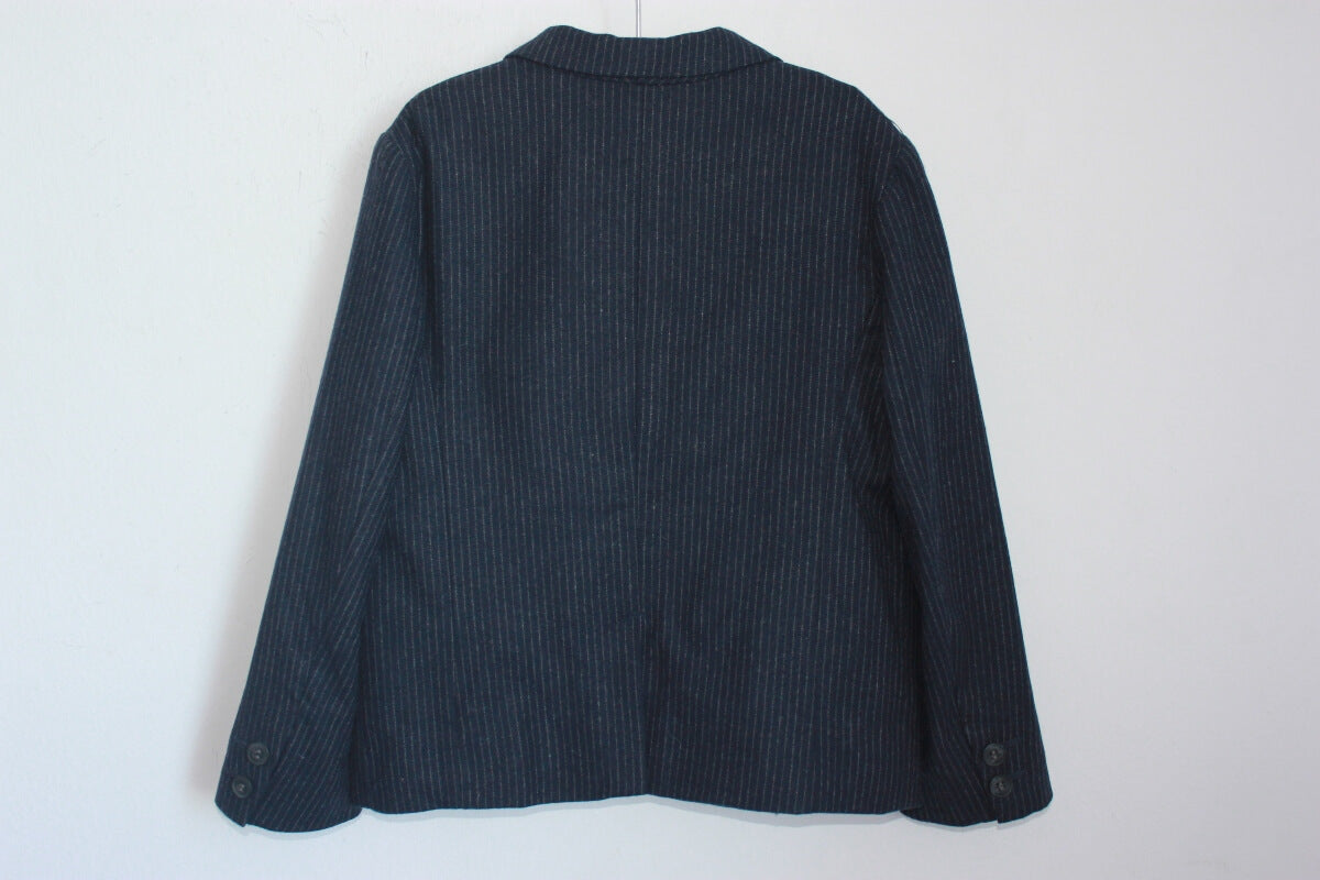 tweedehands donkerblauw kostuum met wit krijtstreepje in maat 110-116 van bonpoint
