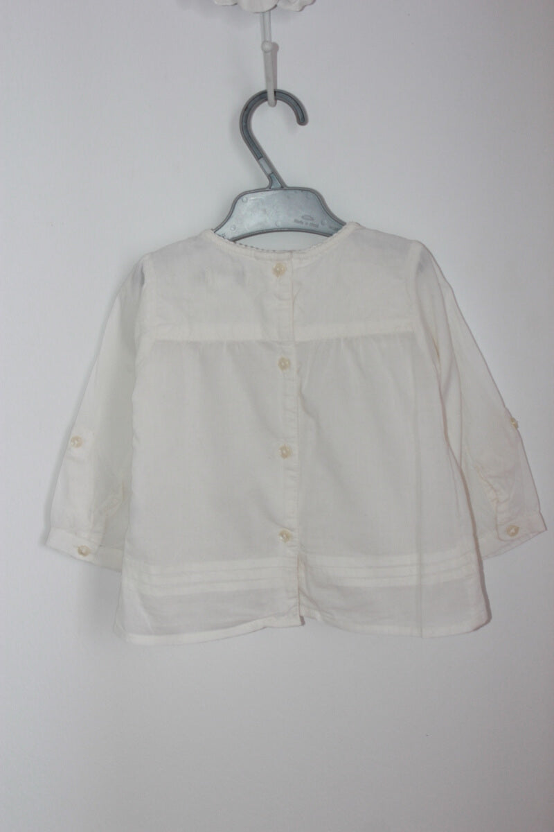 tweedehands katoenen creme blouse met lange mouwen van canada house in maat 68 voor een baby meisje