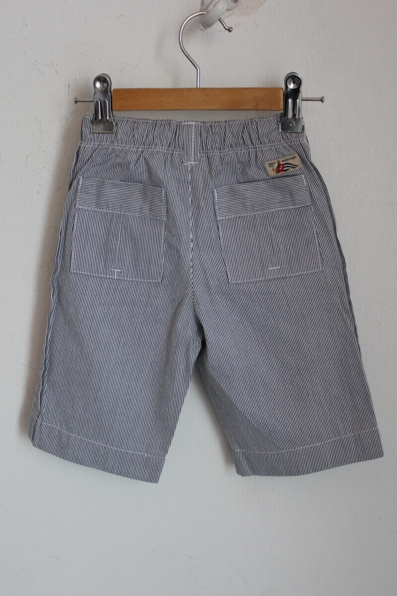 tweedehands katoenen donkerblauw met wit gestreepte lange broek in maat 68 voor een baby jongen van jacadi