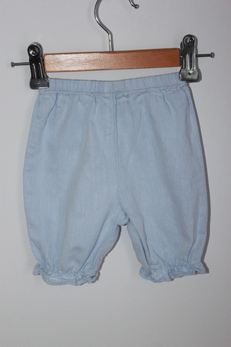 tweedehands zomerse lichtblauwe lange broek in maat 56 voor een baby meisje