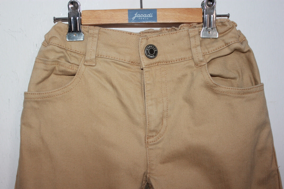 tweedehands unisex mosterdgele lange broek in maat 140 van cyrillus