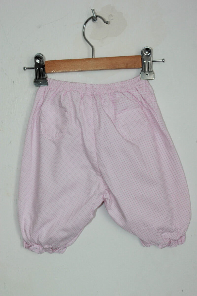 tweedehands katoenen witte lange broek met roze stipjes in maat 62 voor een baby meisje van jacadi