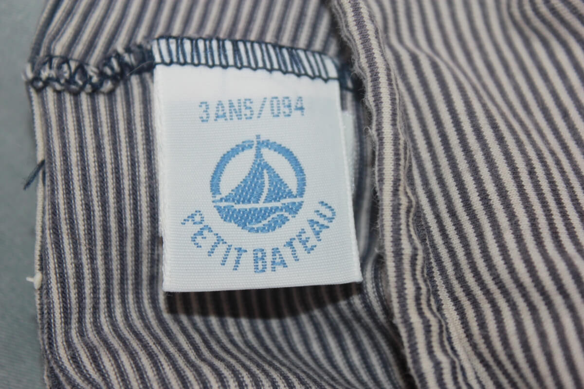 tweedehands donkerblauw met wit gestreept badpak in maat 92 van petit bateau