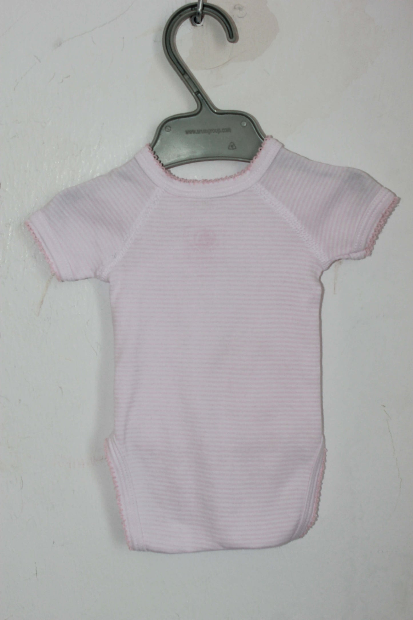 tweedehands roze overslagromper met korte mouwen in maat 46 van petit bateau