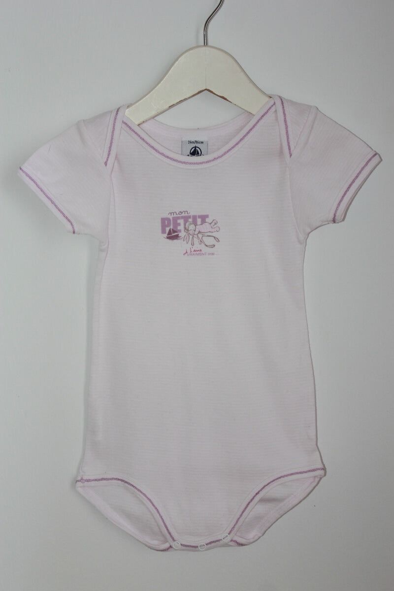 preloved katoenen roze romper met korte mouwen in maat 86 voor een baby meisje van petit bateau