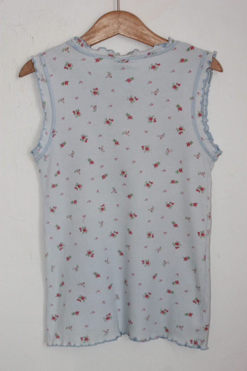 tweedehands katoenen mouwloos lichtblauw gebloemd shirtje in maat 11-12 jaar voor een meisje van petit bateau