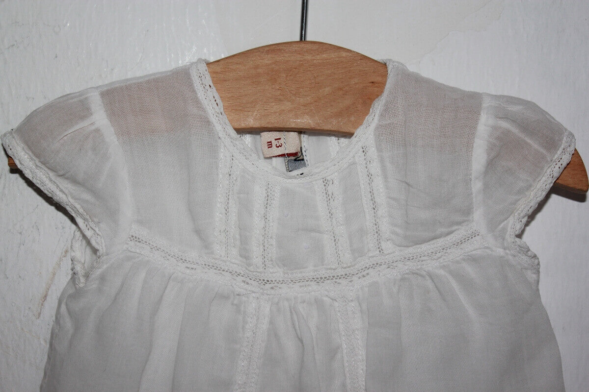 tweedehands zomerse witte blouse met korte mouwen van tizzas in maat 56 voor een baby meisje