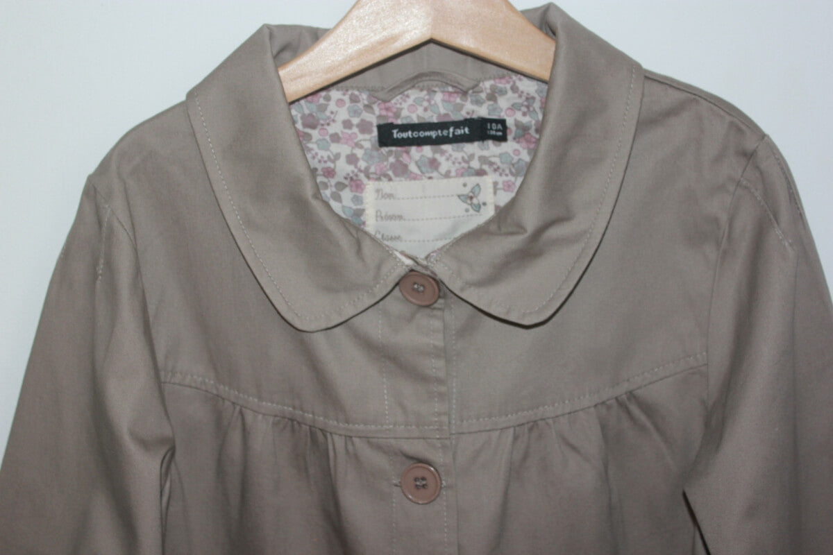 tweedehands katoenen zomerse beige jas van tout compte fait voor een meisje in maat 134-140