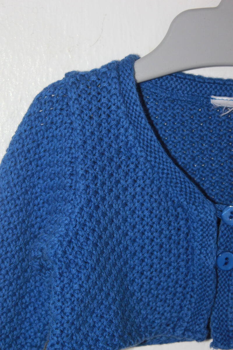 tweedehands korenblauw bolero vestje in maat 62 voor een baby meisje