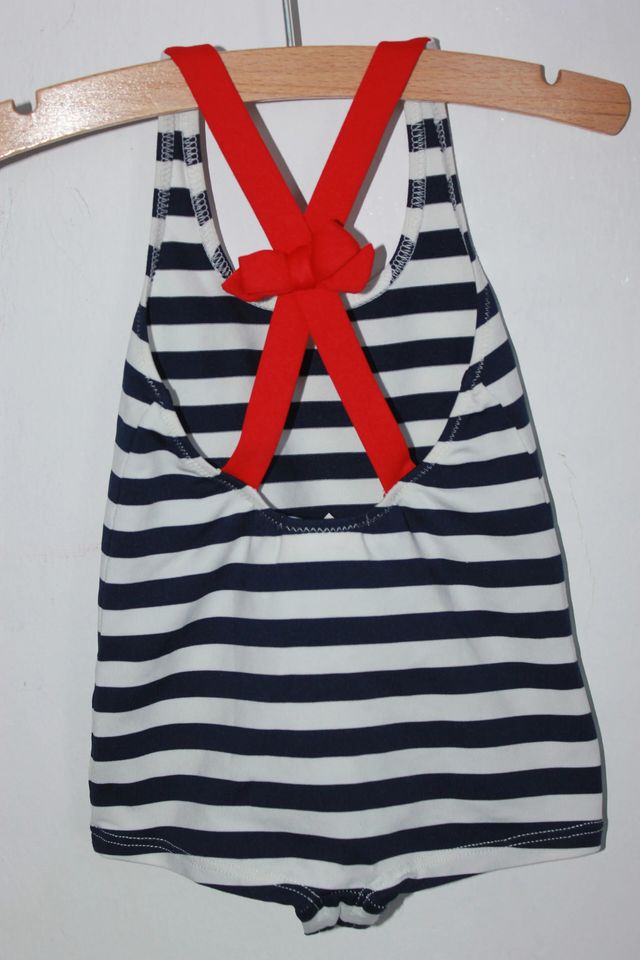 tweedehands donkerblauw met wit en rood gestreept badpak van jacadi in maat 74 voor een baby meisje