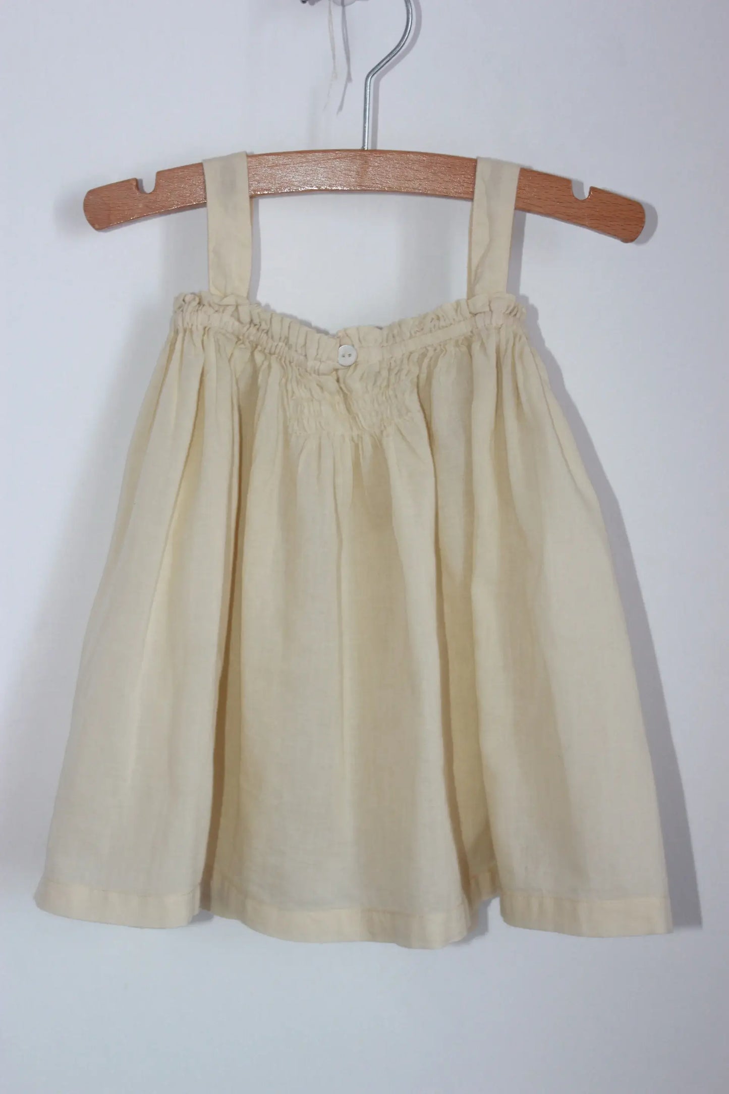 tweedehands katoenen zomerse cremegele, of lichtbeige, jurk met schouderbandjes van bonton in maat 68