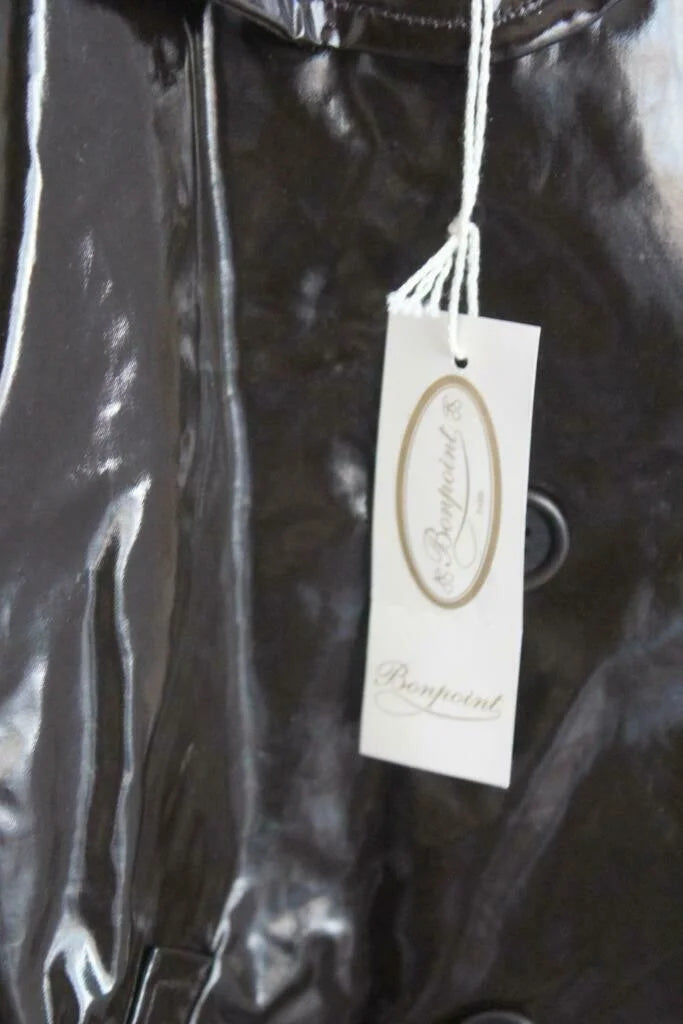 preloved chocoladebruine regenjas met capuchon van bonpoint in maat 122-128 voor een meisje