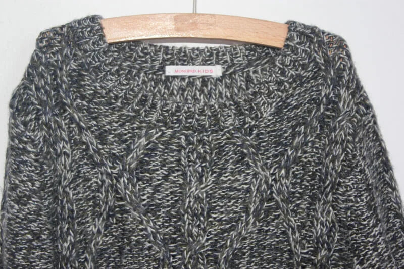 tweedehands-zwart-ecru-olijfgroen-gemeleerde-kabeltrui-maat-110-monoprix