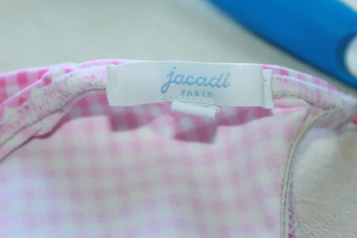 tweedehands roze en wit geruit badpak van jacadi in maat 80 voor een baby meisje