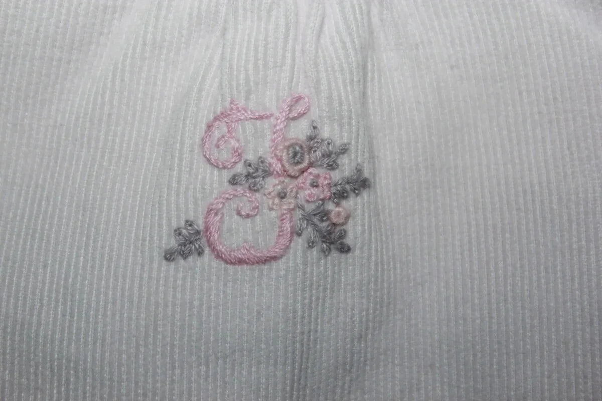 tweedehands katoenen roze ribfluwelen mouwloze jumpsuit van jacadi in maat 62 voor een baby meisje