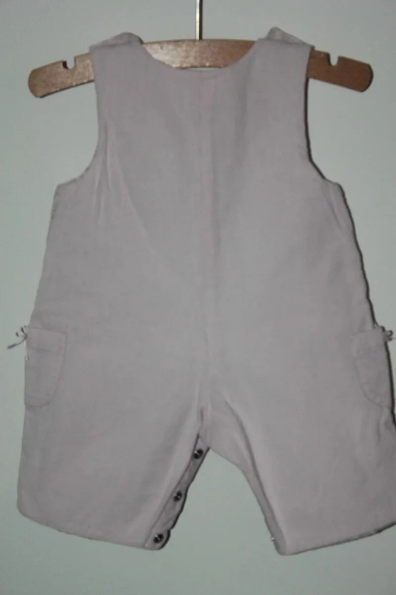 tweedehands katoenen roze ribfluwelen mouwloze jumpsuit van jacadi in maat 62 voor een baby meisje