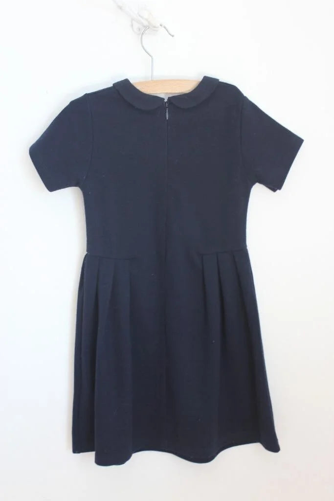 tweedehands donkerblauwe jacadi jurk met korte mouwen in maat 116 voor een meisje