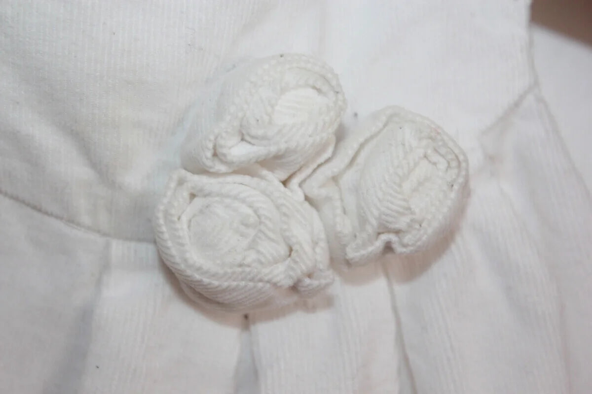 tweedehands mouwloze katoenen witte ribfluwelen jacadi jurk in maat 62
