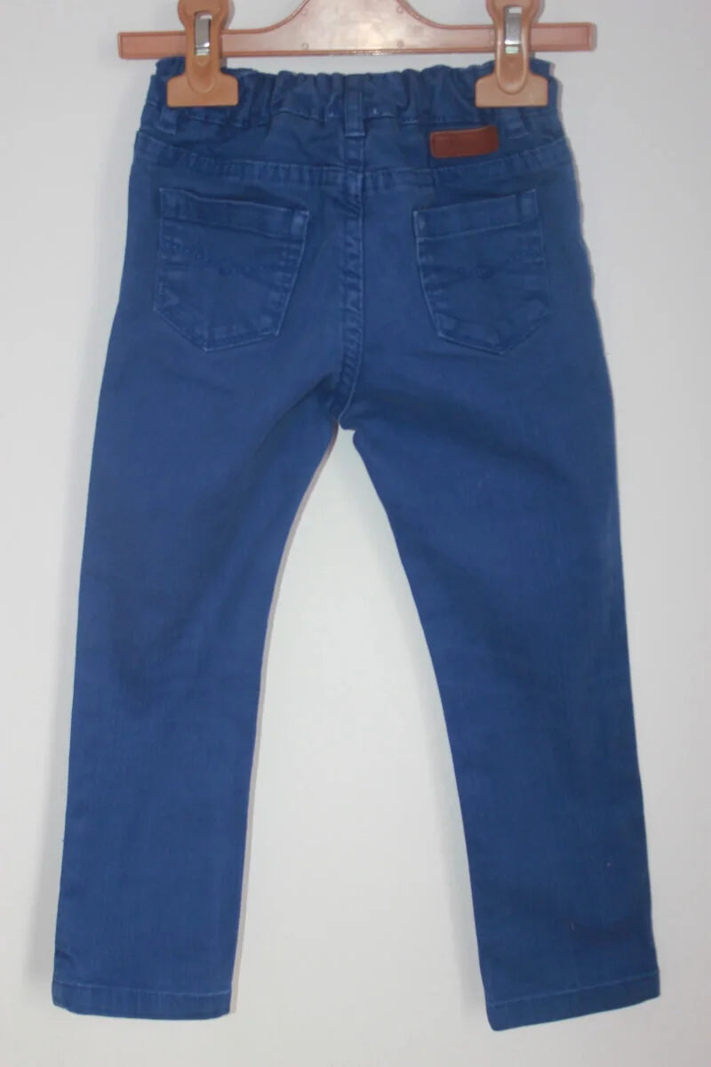 tweedehands unisex blauwe lange jacadi broek in maat 104