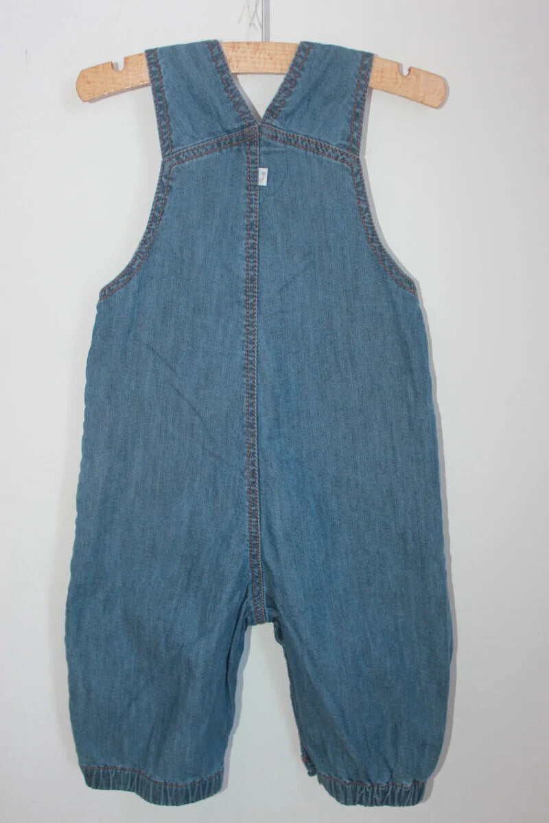 tweedehands unisex katoenen denim salopette of tuinbroek van jacadi in maat 74 voor een baby