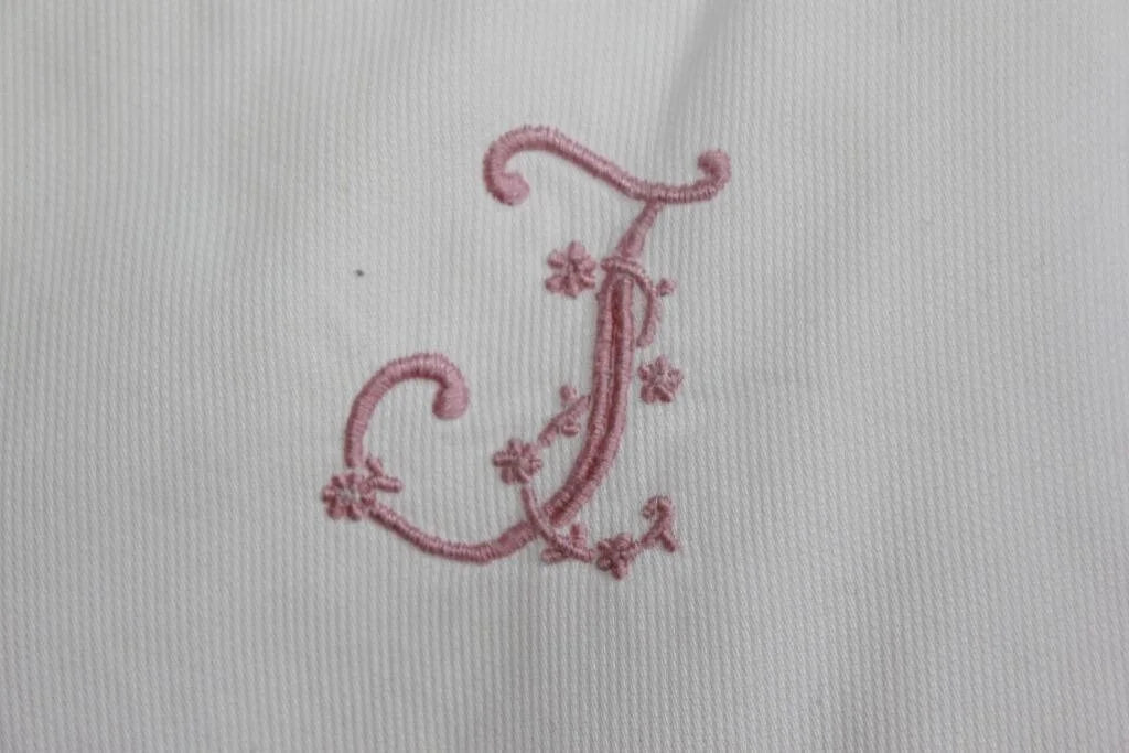 tweedehands mouwloze roze met wit en beige gestreepte slaapzak van jacadi 64 cm voor een baby meisje