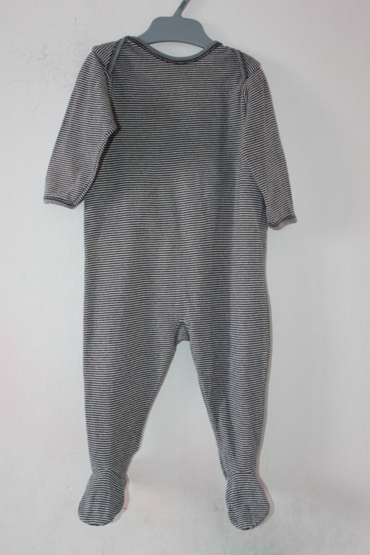 preloved unisex katoenen donkerblauw-ecru gestreepte playsuit met lange mouwen en voetjes van petit bateau in maat 68