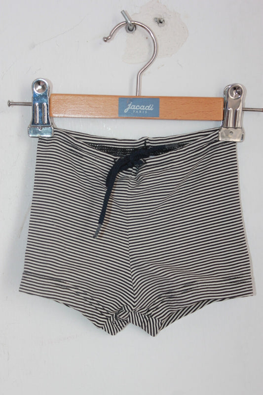 tweedehands donkerblauw met wit gestreepte zwembroek van petit bateau in maat 74 voor een baby jongen