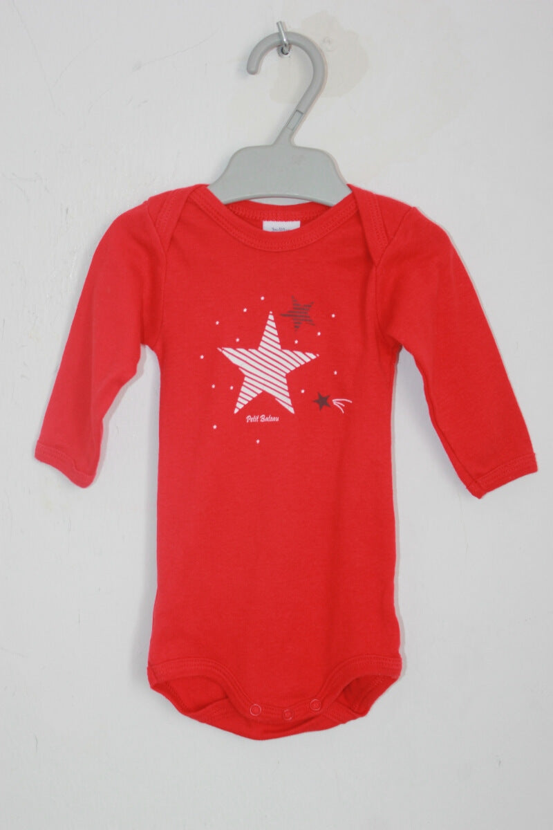 tweedehands unisex katoenen rode romper met lange mouwen in maat 62 van petit bateau