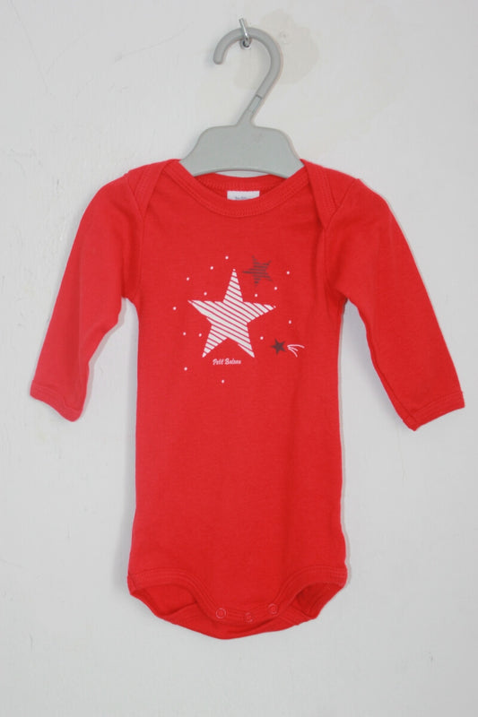 tweedehands unisex katoenen rode romper met lange mouwen in maat 62 van petit bateau