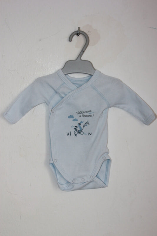 tweedehands unisex katoenen lichtblauwe overslagromper van Petit Bateau met lange mouwen in maat 50 