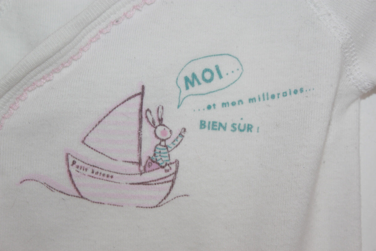 tweedehands katoenen roze overslagromper met lange mouwen in maat 50 voor een baby meisje van petit bateau