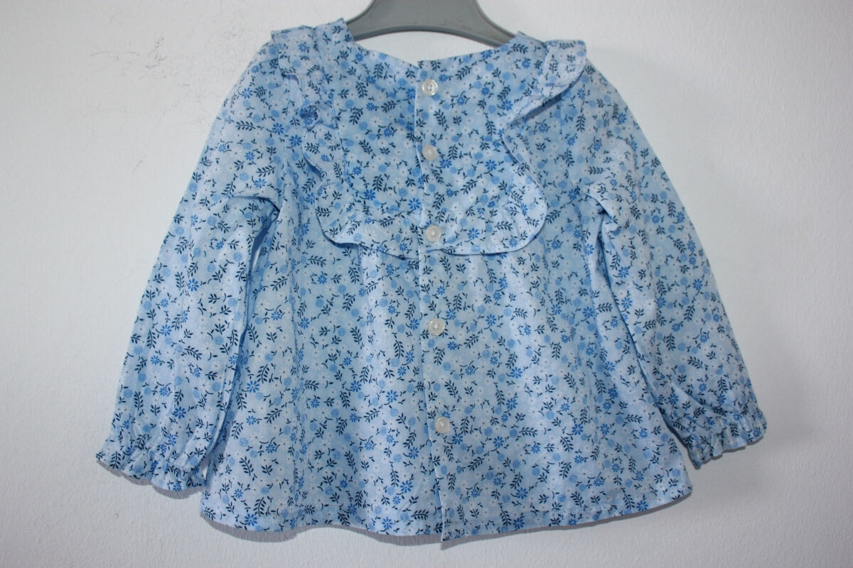 tweedehands-blauwe-gebloemde-blouse-lange-mouwen-volant-tex-maat-74-baby-meisje