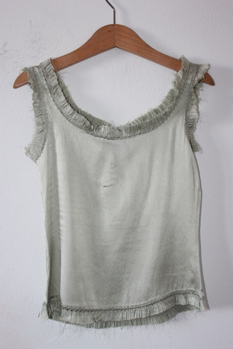 tweedehands-lichtgroene-mouwloze-blouse-maat-116-meisje-essentiel-antwerp