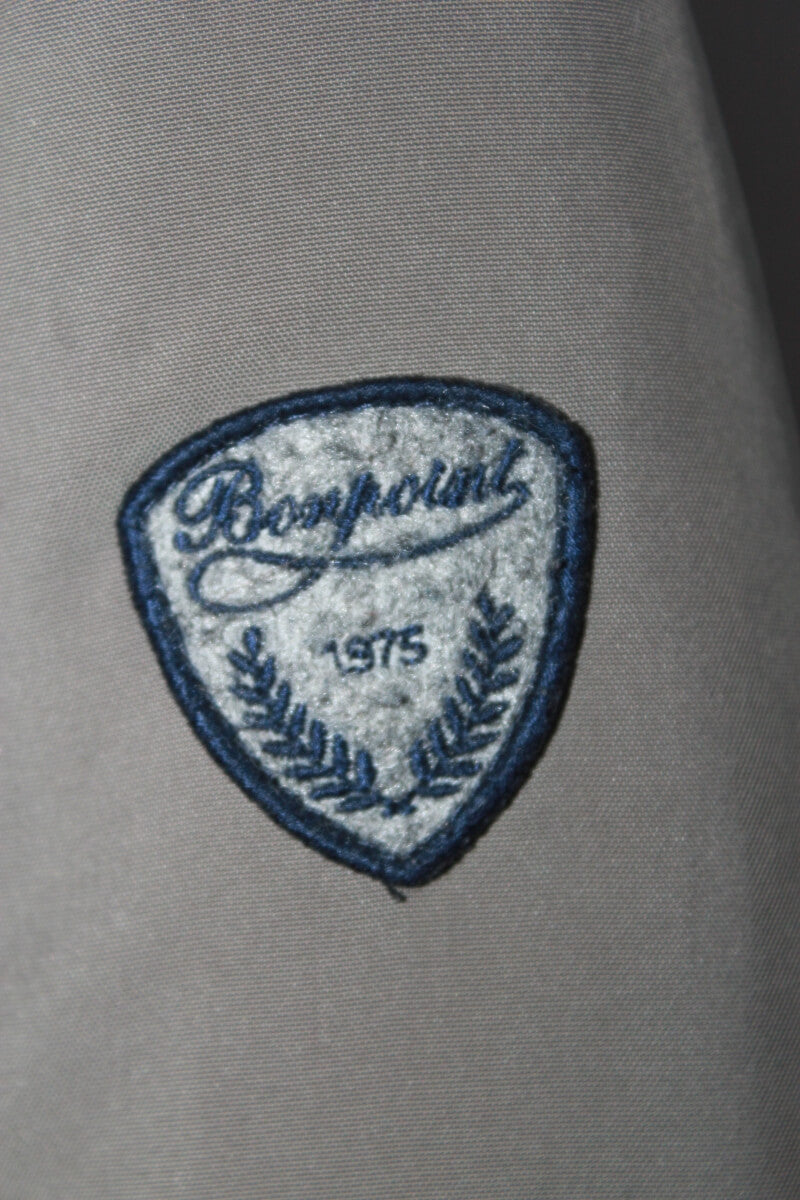 tweedehands unisex legergroene winterjas met capuchon en ecru bont van bonpoint in maat 134-140