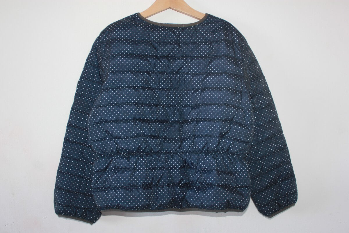 tweedehands donkerblauwe jas met witte stipjes van bonpoint in maat 134-140
