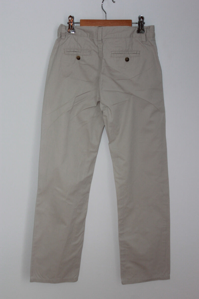 tweedehands beige lange broek in maat 134-140 van gocco voor een jongen 