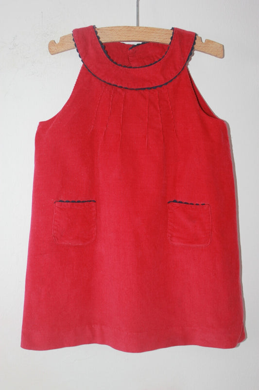 tweedehands katoenen ribfluwelen mouwloze rode jurk met donkerblauwe accenten in maat 80 voor een baby meisje van jacadi