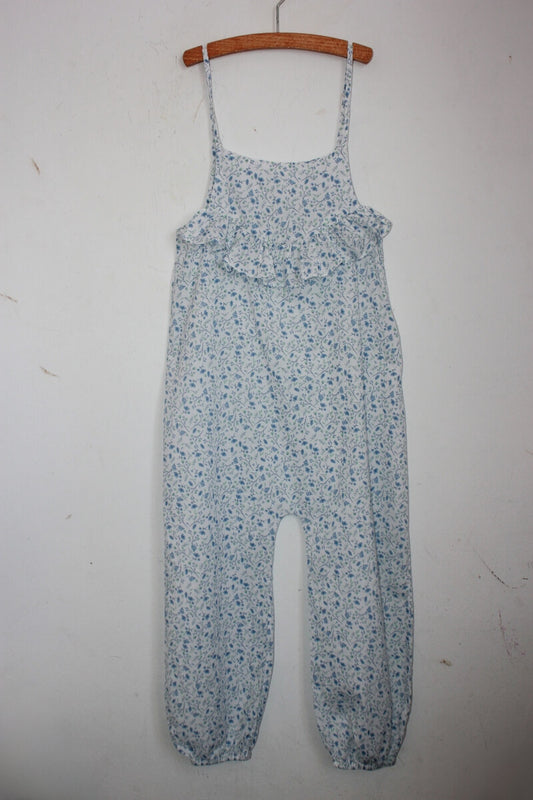 tweedehands katoenen lichtblauw met wit gebloemde zomerse jumpsuit  in maat 116 van lola palacios