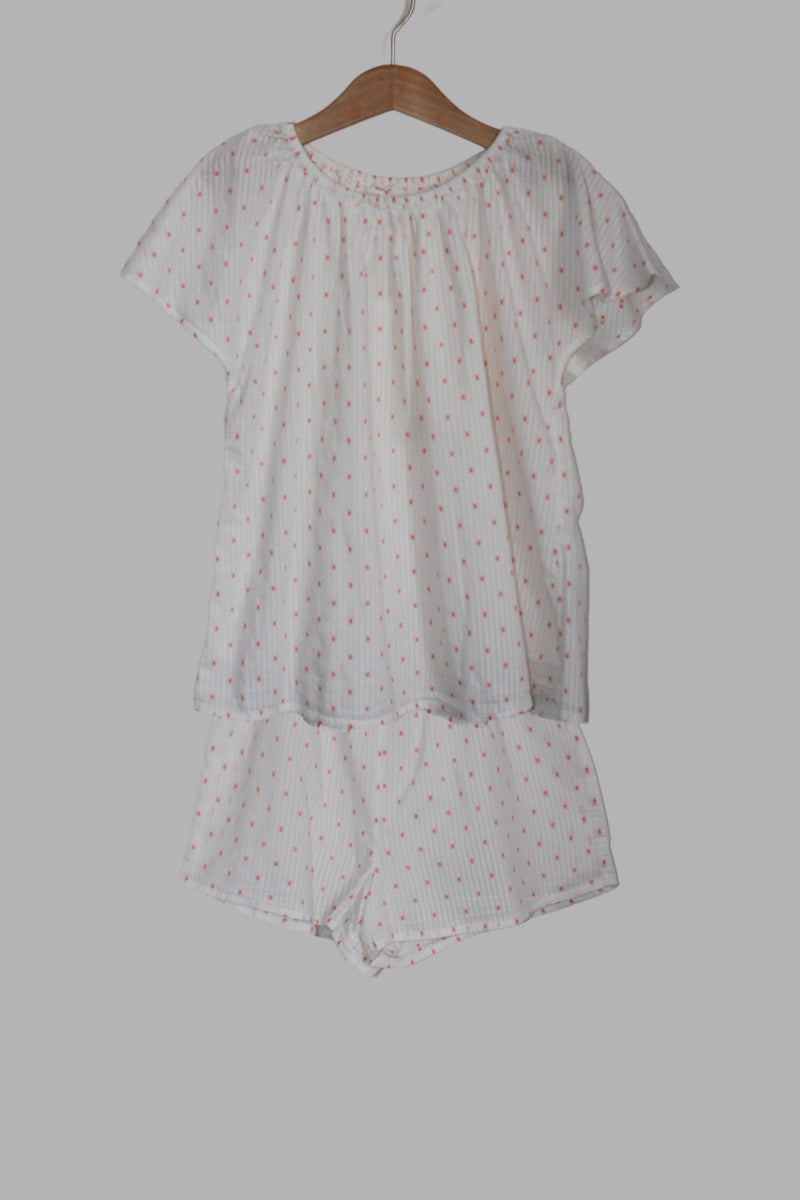 tweedehands witte zomerse pyjama met koraalroze stipjes en korte mouwen voor een meisje in maat 134-140 van Monoprix