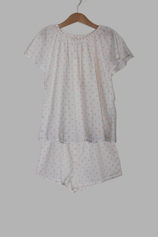 tweedehands witte zomerse pyjama met koraalroze stipjes en korte mouwen voor een meisje in maat 134-140 van Monoprix