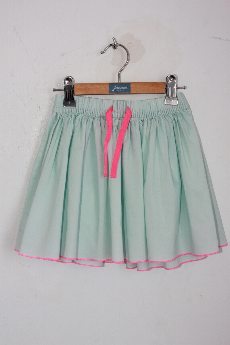 tweedehands katoenen lichtgroene zomerse rok met felroze details in maat 110 van petit bateau